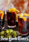 At La Violeta, a vermuteria in the Chamberi neighborhood of Madrid, the drink is served in the classic manner, with a wedge of orange and green olives.